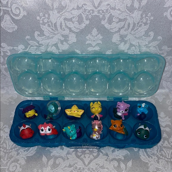 Hatchimals Other - Hatchimals CollEGGtibles.  Colorful Animal Figurine Set in Blue Case.  Qty. 12.
